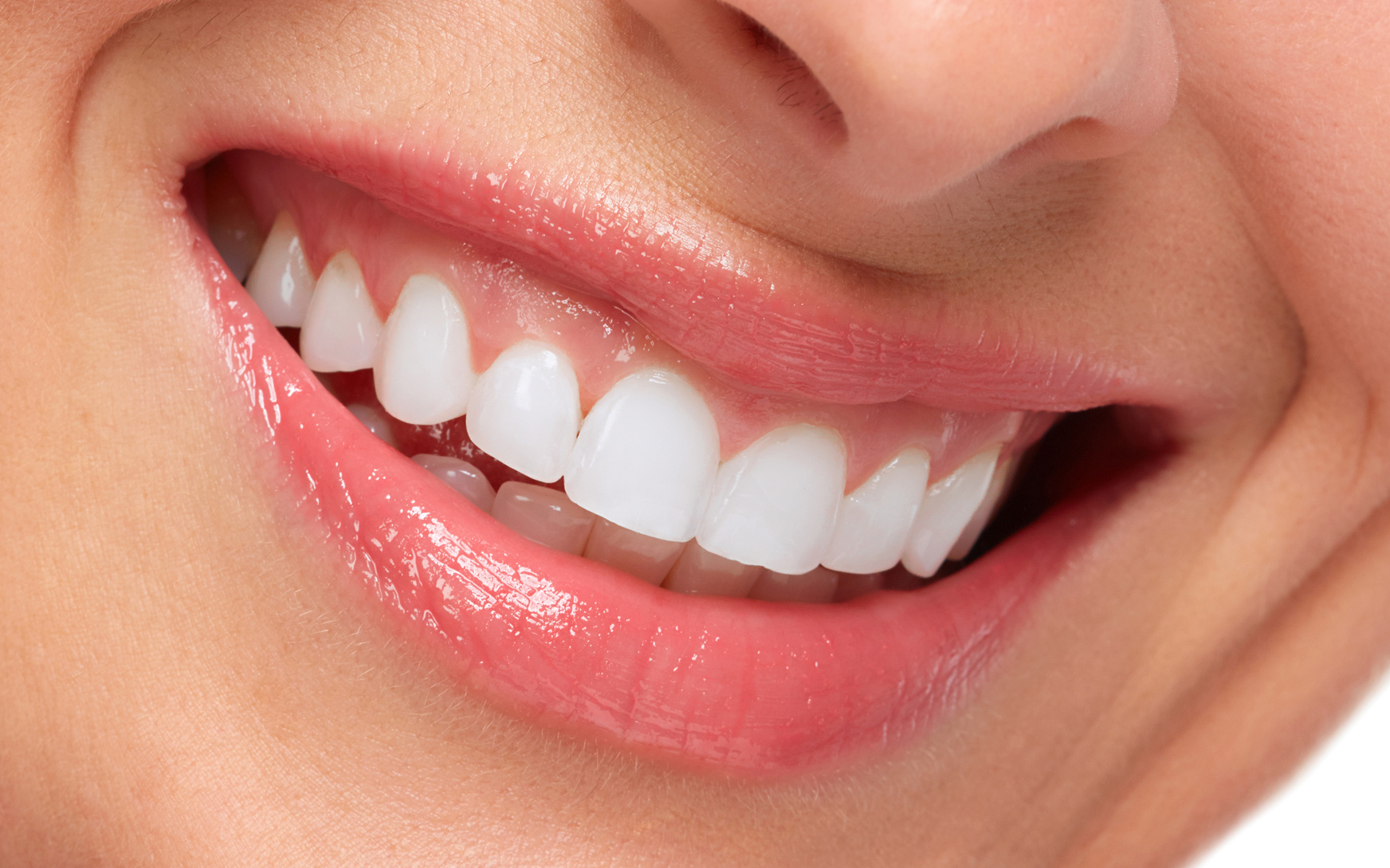 Happy young woman face with healthy white teeth. Dental health
