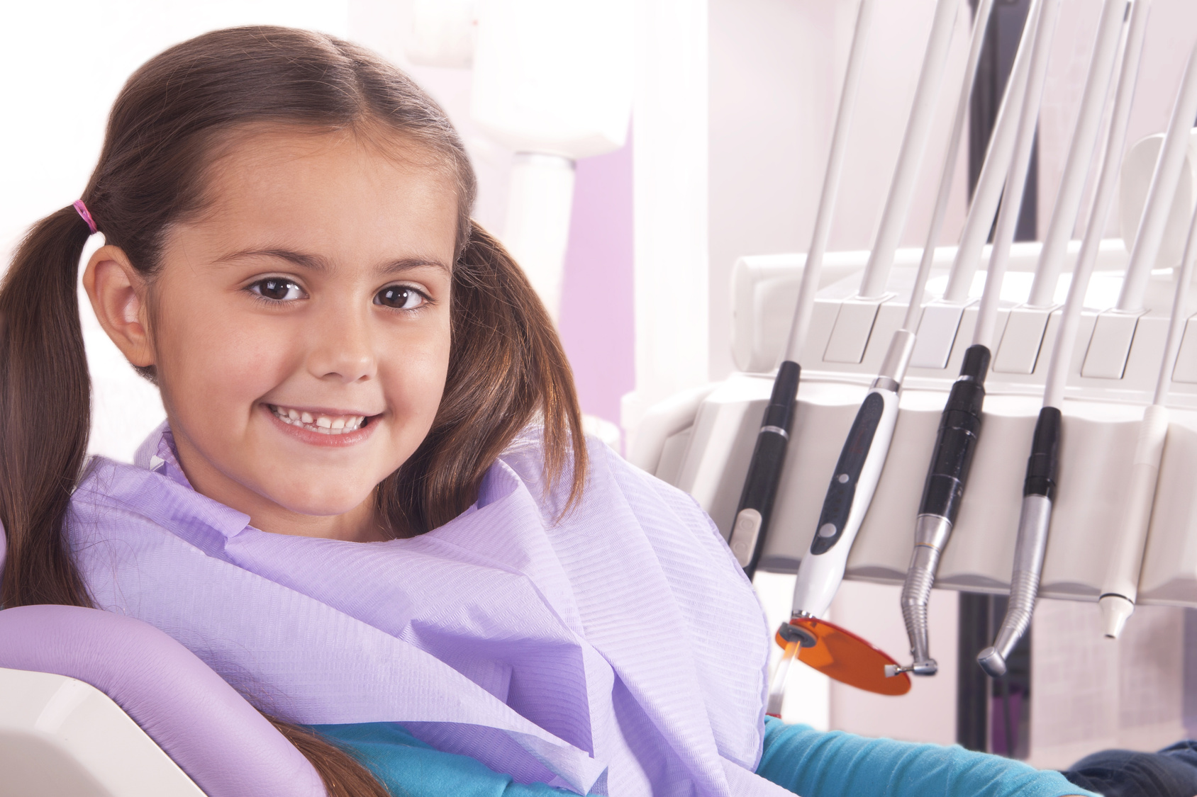 pretty little  girl in dentist office